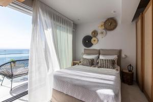 Postel nebo postele na pokoji v ubytování Nōema Premium Stay