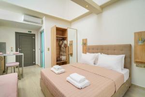 Yasemi Luxury Rooms客房内的一张或多张床位