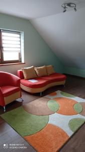 Część wypoczynkowa w obiekcie Dębowy Apartamenty/Pokoje