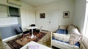 Ein Sitzbereich in der Unterkunft Apartments in Villa Isabel