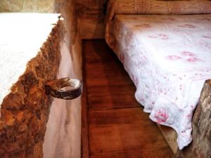 Posteľ alebo postele v izbe v ubytovaní Cottage al Merlo Olivo