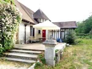 En hage utenfor Maison AUGER
