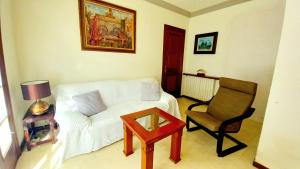 Ein Sitzbereich in der Unterkunft Apartments in Villa Isabel