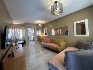 TV a/nebo společenská místnost v ubytování DREAM WISH