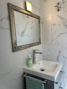 Koupelna v ubytování DREAM WISH + 27 fotografií