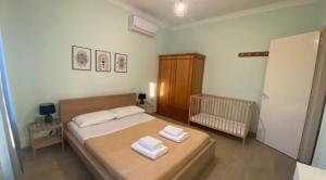 Ένα ή περισσότερα κρεβάτια σε δωμάτιο στο Theros Garden House