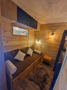 Giường trong phòng chung tại Belle-Plagne / Cœur de station / Ski aux pieds