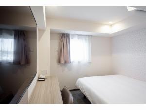 Krevet ili kreveti u jedinici u objektu Kuretake Inn Premium Tajimi Ekimae