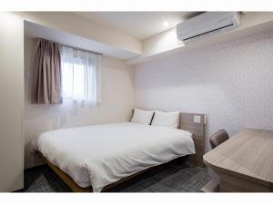 Krevet ili kreveti u jedinici u objektu Kuretake Inn Premium Tajimi Ekimae