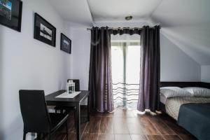 Postel nebo postele na pokoji v ubytování Rezerwat85