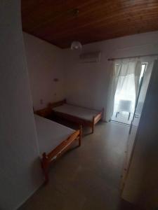 Fotografie z fotogalerie ubytování Christina Sunny Rooms v destinaci Loutsa