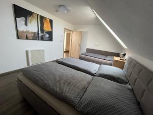 Postel nebo postele na pokoji v ubytování Wellness chalupa Soběšice - brána na Šumavu + 37 fotografií