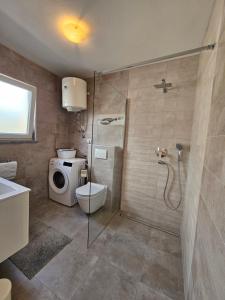 Koupelna v ubytování Apartmani Gržinić