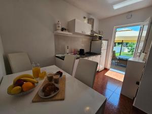 Kuchyň nebo kuchyňský kout v ubytování Apartmani Gržinić