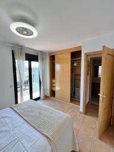 Łóżko lub łóżka w pokoju w obiekcie Villa Do Juano