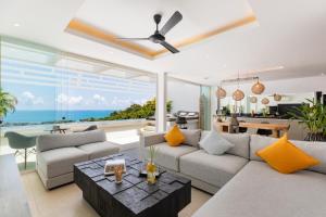 Posezení v ubytování STUNNING SEA VIEW DESIGN LOFT WITH INFINITY POOL - Aqua Villa Samui Atlantis 9