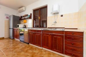 Kuchyň nebo kuchyňský kout v ubytování Apartments Djani + 37 fotografií