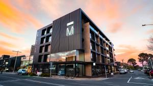 a rendering of a building with a sign on it at The Mayfair in Christchurch
