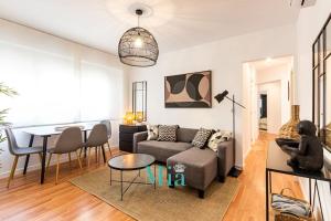 Posezení v ubytování City and Beach Apartment