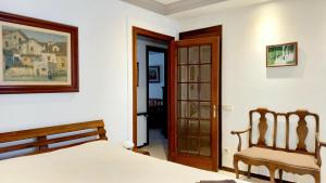 Ein Bett oder Betten in einem Zimmer der Unterkunft Apartments in Villa Isabel