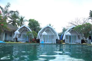 a view of a resort with a swimming pool at Dream CoWork Hotel in Kuta Lombok