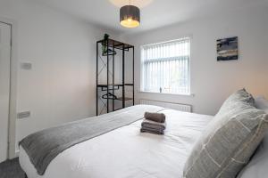 Säng eller sängar i ett rum på Free Parking Contractor Leisure Close 2 Warrington