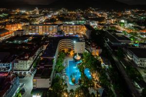 an aerial view of a city at night at The Royal Paradise Hotel & Spa in Patong Beach