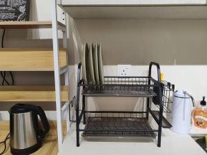 Příslušenství pro přípravu čaje a kávy v ubytování KLCC 6pax family studio wi-fi