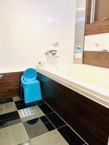 Koupelna v ubytování Asokono Hotel