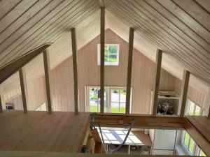 an inside view of a room in a house at Melluži tiny house 35m2 in Jūrmala