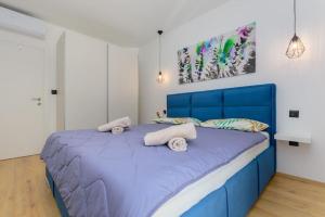 Postel nebo postele na pokoji v ubytování Villa Balun in Orihi - 3 bedrooms - pool - garden - sauna + 49 fotografií