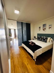 Ένα ή περισσότερα κρεβάτια σε δωμάτιο στο Apartamento Las vistas +18 φωτογραφίες