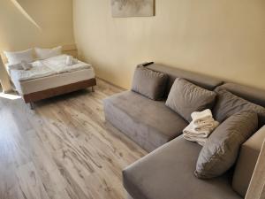 Postel nebo postele na pokoji v ubytování Apartament Piłsudskiego