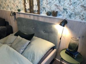 Кровать или кровати в номере Ferienhaeuschen-Duderstadt
