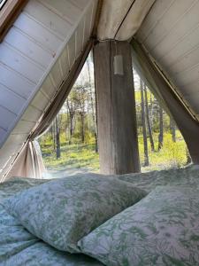 Postel nebo postele na pokoji v ubytování Nordicstay Noarootsi Saunahouse