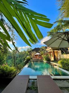 Bazén v ubytování Nata Ubud nebo v jeho okolí