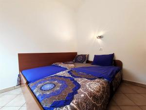 Posteľ alebo postele v izbe v ubytovaní Lavanda apartment