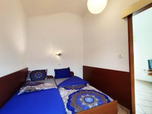 Posteľ alebo postele v izbe v ubytovaní Lavanda apartment