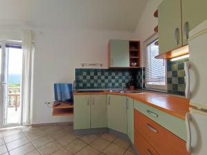 Kuchyňa alebo kuchynka v ubytovaní Lavanda apartment