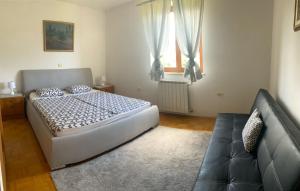 מיטה או מיטות בחדר ב-Casa Monte Calvo