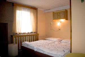 Postel nebo postele na pokoji v ubytování Hotel-Penzion Johanka