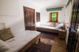 Tempat tidur dalam kamar di Estate Žagmeštri