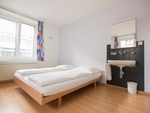 Ένα ή περισσότερα κρεβάτια σε δωμάτιο στο Hotel Gregory