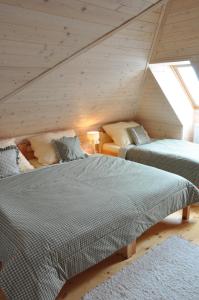 Ліжко або ліжка в номері Sny pod jasany