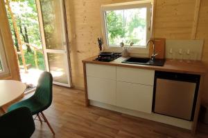 Una cocina o cocineta en Treehouse LEA