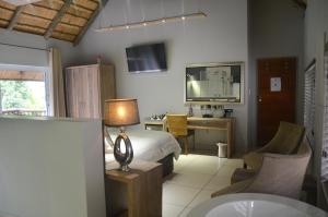 Η κουζίνα ή μικρή κουζίνα στο Highveld Splendour Boutique Bed and Breakfast +29 φωτογραφίες