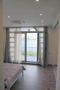 Photo de la galerie de l'établissement Apartment Felicita Prcanj Boko Kotor, à Kotor