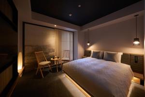 Postel nebo postele na pokoji v ubytování Hotel Resol Trinity Osaka