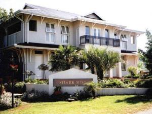 a large house with a sign in front of it at Silver Mist Guest House, Country Inn and Herberg in Kaapsehoop