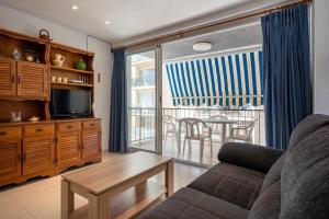 Ruang duduk di AT105 Primera línea de la playa, airco